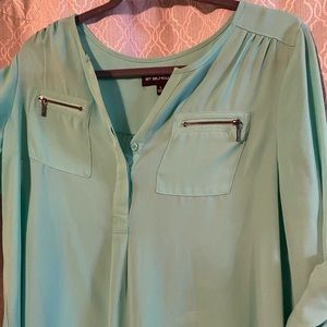 Barely used cute turquoise sheer blouse